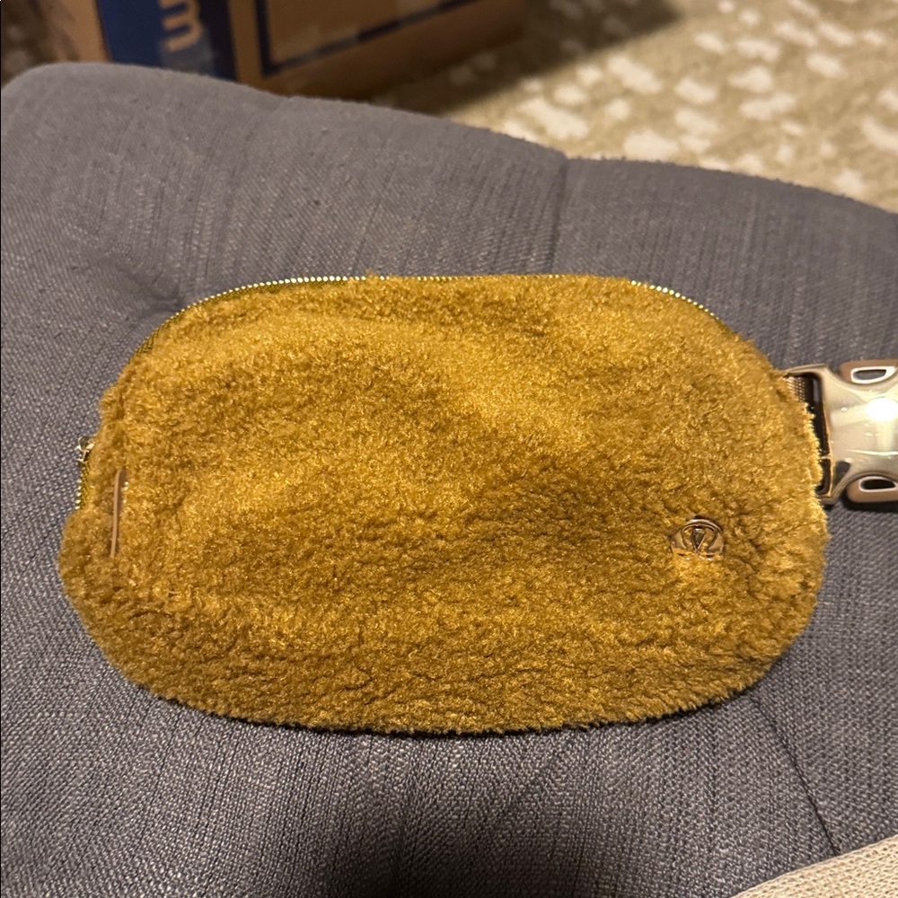 Lululemon Gold Fuzzy Pouch